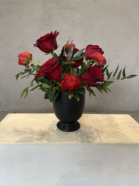 the red flag vase arrangement